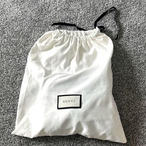 Worn 1x basically brand new in dustbag with original paper stuffing inside.